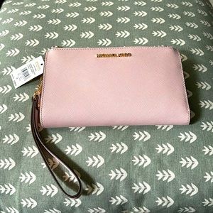 NEW WITH TAGS. Michael Kors wristlet wallet. Never used.